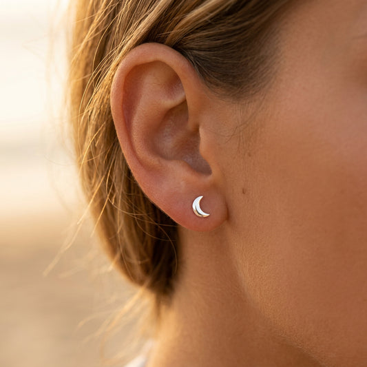 Model wearing Sterling silver crescent moon stud earring by My Silver Wish