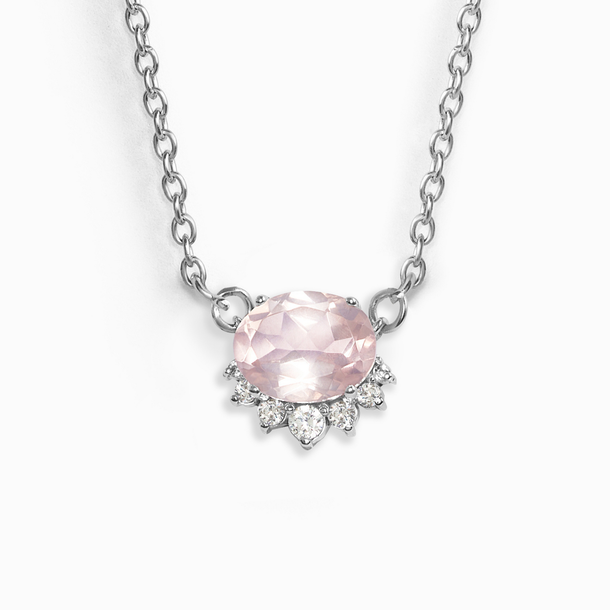 Necklace with a rose quartz gemstone and silver chain on a white background