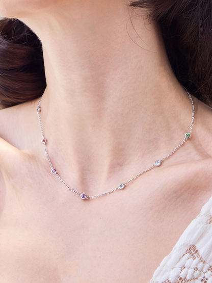 Necklace with colourful gemstones worn by a women