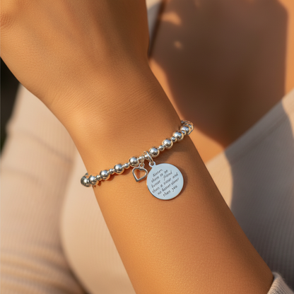 Woman wearing a "Sister there is no better friend..." women's sterling silver stacking bracelet by My Silver Wish