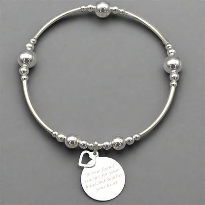 "A true friend reaches for your hand, but touches your heart" women's sterling silver stacking bracelet by My Silver Wish