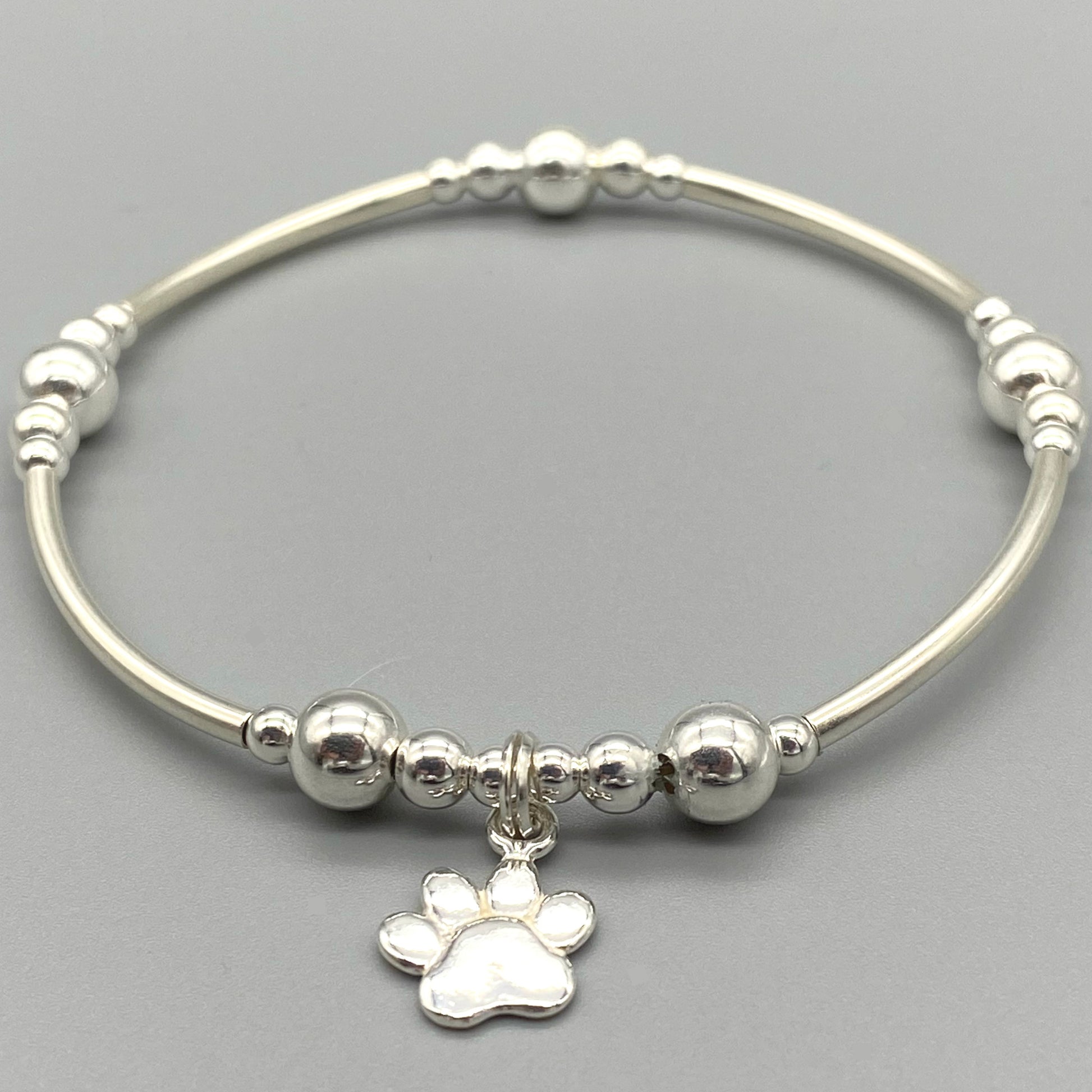 Dog paw charm women's sterling silver stacking bracelet by My Silver Wish