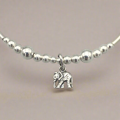 Closeup of Elephant charm sterling silver women's stacking bracelet by My Silver Wish