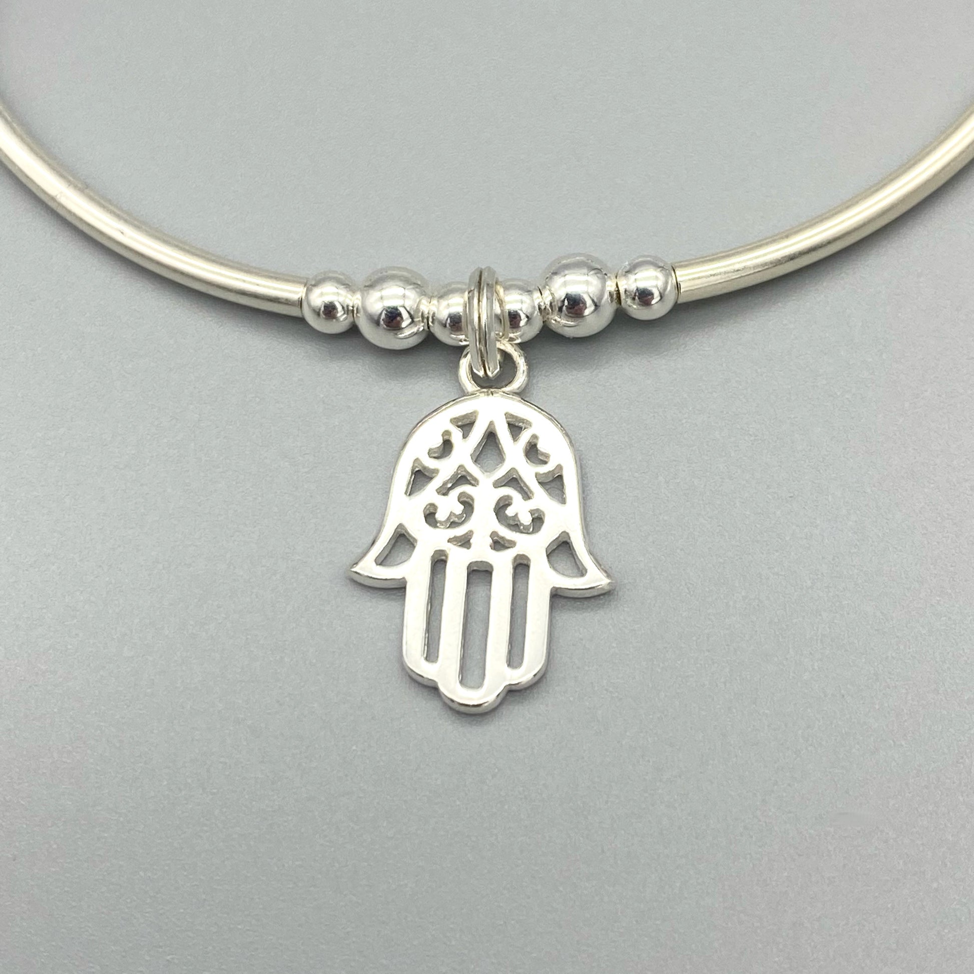 Closeup of Hamsa hand charm chakra crystal sterling silver stacking bracelet for her by My Silver Wish