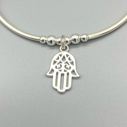 Closeup of Hamsa hand charm chakra crystal sterling silver stacking bracelet for her by My Silver Wish