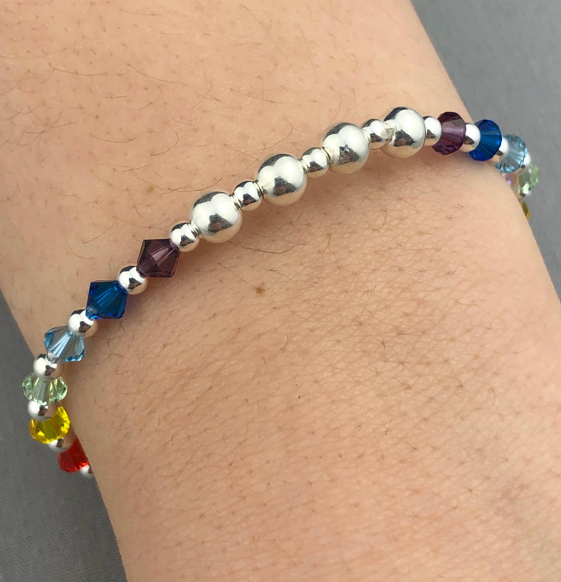 Closeup of Heart Charm Rainbow Crystals Sterling Silver Women's Stacking Charm Bracelet by My Silver Wish