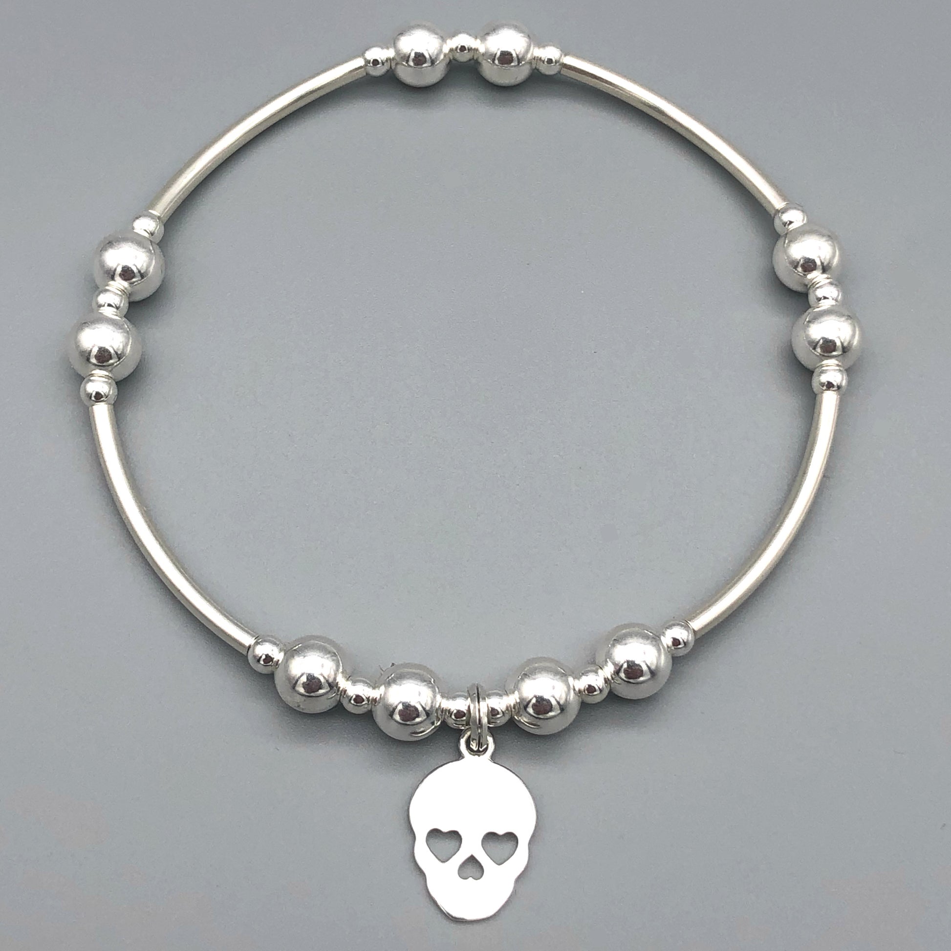 Skull charm sterling silver hand-made women's stacking bracelet by My Silver Wish