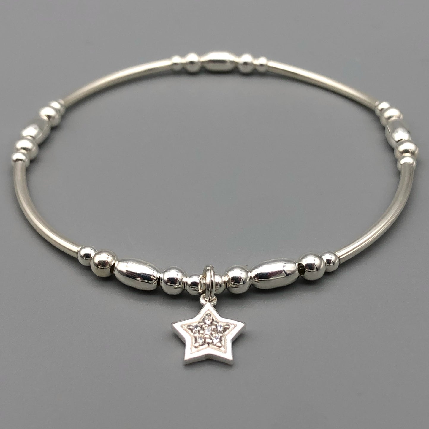 Star charm sterling silver stacking charm bracelet by My Silver Wish