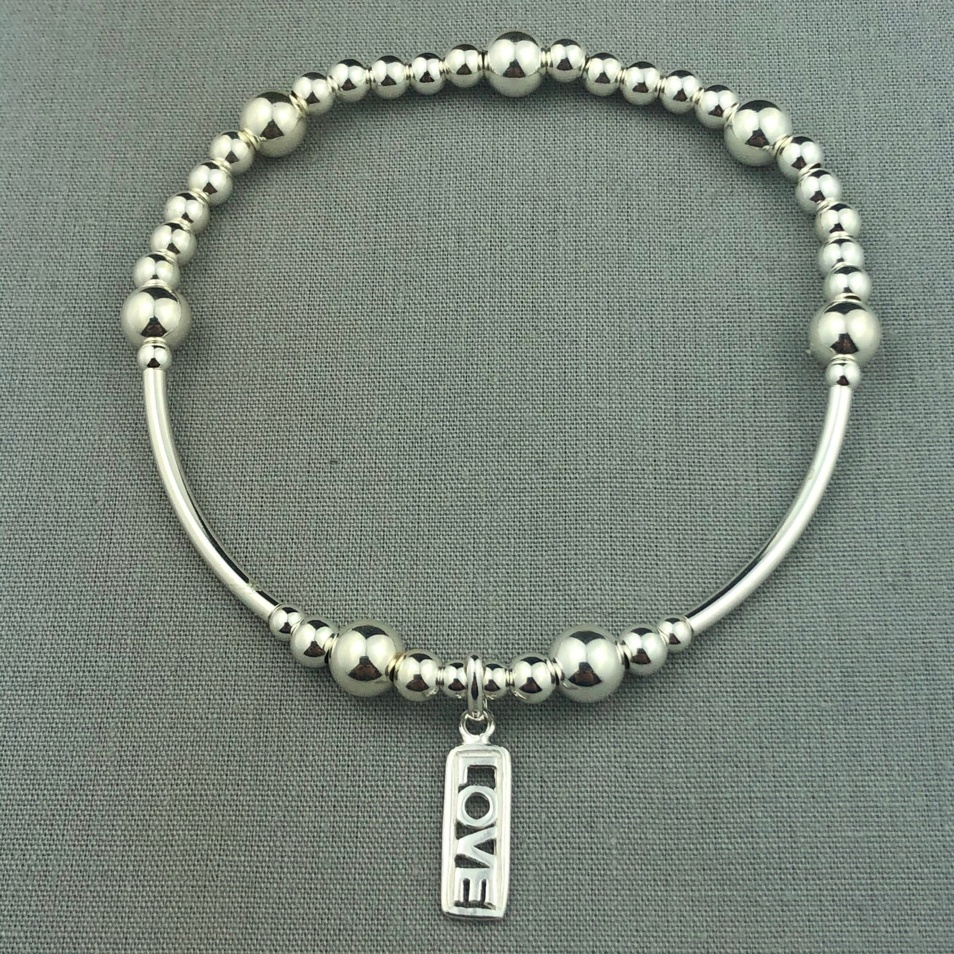 "Love" tag charm sterling silver stacking charm bracelet by My Silver Wish